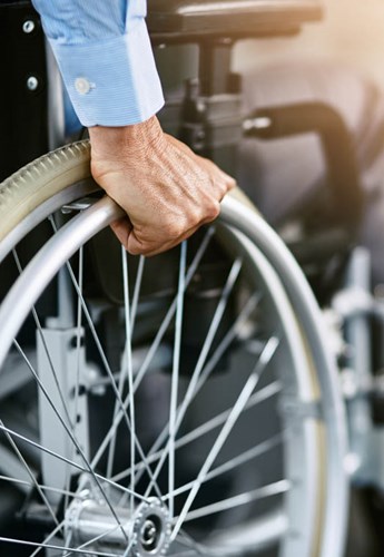 Zoomed in image of a man in a wheelchair